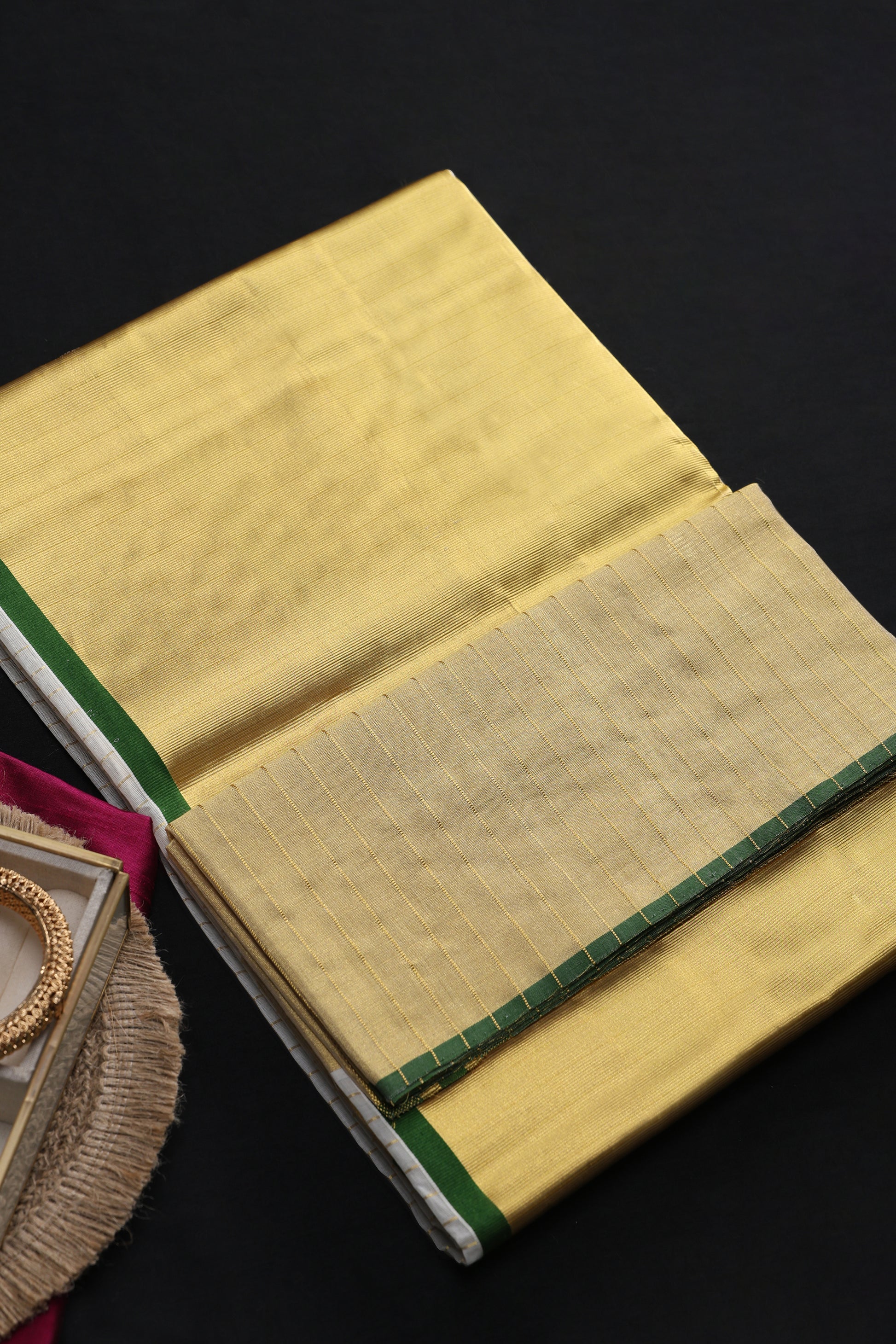 Rajeshwari Heirloom Check Green Saree