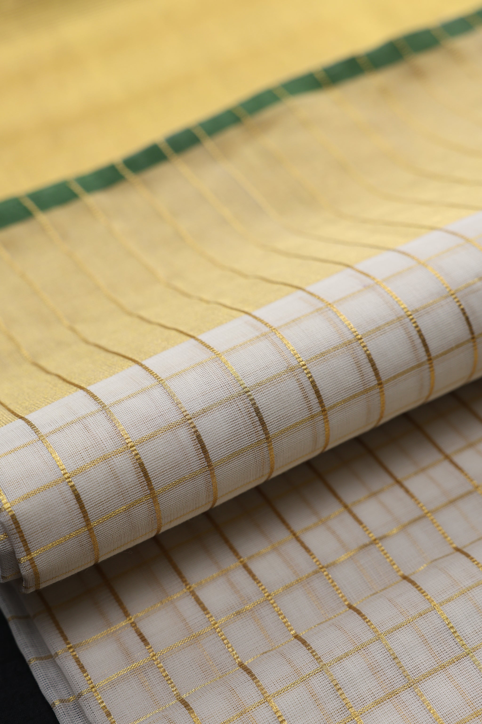 Rajeshwari Heirloom Check Green Saree